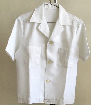 Safari style white jackets with pockets with high waisted pants. South Africa, Pretoria, Villiera
