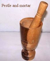 To crunch, grind or mash food, nuts and spices. South Africa, Pretoria, Villieria